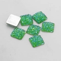 Macro shot of 12mm green resin glitter flatback squares with silver base for DIY jewelry - Green Glitter Style (2)
