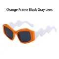 Trendy orange sunglasses with wavy white temples and grey lenses for a Y2K street style - Orange Frame White Leg Black Gray Lenses