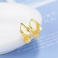 Golden star pendant earrings with three pentagrams on a minimalist metal ring - Gold