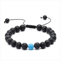 Close-up of lava rock beads and blue crackle stone on adjustable braided bracelet - Black Lava Stone with Single Blue Crackle Bead (Size 7)