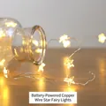 Battery-operated warm white LED copper wire star lights inside a glass jar decor - Battery Star Style Copper Wire Lights