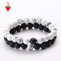 Detail of beaded bracelet set with white turquoise stones and black matte lava rock beads - White Howlite & Lava Stone Bracelet Set (Combo 5)
