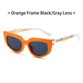 Cat eye sunglasses with bright orange frame and gold metal chain temples for women - Orange Frame Grey Lens