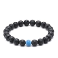 Macro shot of 8mm black lava rock beads and blue cracked agate on a beaded bracelet - Black Lava Stone + 1 Blue Vein Stone (No.2)