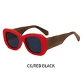 Modern sunglasses featuring bold red frames with bamboo texture legs and dark grey lenses - Red Frame Dark Grey Lens