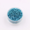 2MM shiny metallic blue glass seed beads in a round storage container for DIY jewelry - Peacock Blue