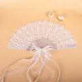 Elegant white lace folding fan with pearl accents and decorative long ribbon tassels - Sequined Pearl Style