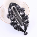 Vintage black banana hair clip featuring silver butterfly and floral resin relief - Two Flowers / Painted Silver