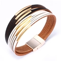 Multi-layer leather bracelet with black, white and brown strands and gold metal accents - Black + White