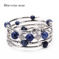 Multi-layer bracelet featuring blue-veins stone beads and engraved silver metal rings - Sodalite Bracelet