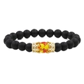 Matte zwarte stenen kroon armband met gouden zirkoon en amberkleurige kraal elastiek - Matte Barnsteen Gouden Kroon
