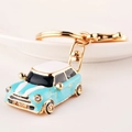 Mini car keychain in light blue with white roof and gold metal edges and rhinestones - Chy-2102 / Lake Blue