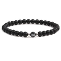 Macro detail of 6mm black matte bead bracelet with silver spacers and letter M charm - Letter M
