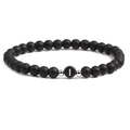 Detail of 6mm matte black stone bead bracelet with letter I and silver metal accents - Letter I