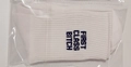 White cotton ankle socks featuring black FIRST CLASS BITCH text print in packaging - FIRST CLASS BITCH