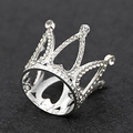 Detailed macro view of silver alloy crown with sparkling rhinestones on black surface - Mini Full Rhinestone Silver