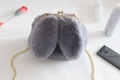 Cute gray plush rabbit bag with gold metal frame and chain strap on a white surface - Light Gray