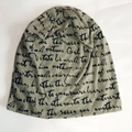 Olive green slouchy beanie with black handwritten cursive text print design - Mustard