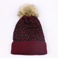 Detailed knit texture of burgundy leopard print beanie with thick ribbed cuff and pom - M (56-58cm) / Burgundy