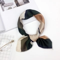 Silk feel small square scarf featuring green and brown geometric stripes tied in a knot - Striped Orange