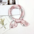 Pink silk square scarf with white swan print styled in an elegant knotted tie - Swan Pink