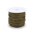 Macro view of bronze plated snake chain on a roll for DIY jewelry making - 1.2mm / Bronze