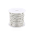 Detailed close-up of a 10-yard silver-plated snake chain roll on a white spool for jewelry - 1.2mm / Silver