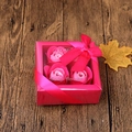Pink heart-shaped gift box featuring four soap roses and a decorative pink ribbon - 4 Flowers Paper Gift Box (Pink Set)