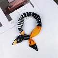 Elegant silk scarf with orange color blocking and geometric polka dots on a white background - Orange Patchwork Polka Dot