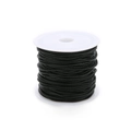 Close-up of black braided cord for jewelry making neatly wound on a white spool - Black
