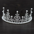 Silver bridal crown with faux pearls and crystals on a dark wood background - 021 Simple Version