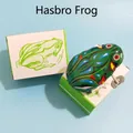 Classic wind-up tin frog toy with vintage patterns and its white packaging box - Classic Green Frog