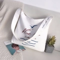 White canvas shoulder bag with Blue Summer ocean print and wide graphic strap - Flying Bird Pattern