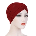 Detail shot of the criss-cross pleats on a dark red elastic turban headscarf - Burgundy