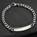 ID-Armband aus poliertem Edelstahl mit Panzerkette auf schwarzer Lederstruktur - Klein / Silber