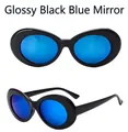 Close-up of retro oval sunglasses in bright black frame with blue mirror lenses - Bright Black Frame Blue Mirror Lens