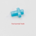 Macro detail of blue opal cross bead showing horizontal hole for jewelry making - Blue No.2 - Horizontal Hole