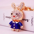Golden rabbit keychain with blue enamel dress and sparkling rhinestones for bags - Blue