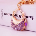 Portachiavi dorato con borsa in strass viola e nappa decorativa da donna - Viola