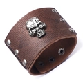 Brown leather men's wristband featuring silver skull metal accents in wide gothic style - Brown