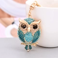 Portachiavi a forma di gufo con strass blu e finitura dorata su tazza in ceramica - Civetta con Ali Spiegate / Blu