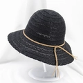 Detailed view of black hollow lace sun hat with brown woven rope and bow accent - M (56-58cm) / Black