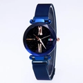 Detail of blue starry dial watch with magnetic mesh strap and diamond-cut case - Blue