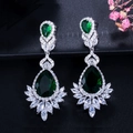 Macro detail of emerald water-drop earrings with AAA zircon inlay on silver base - Green