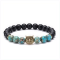 Detail of 8mm matte black and turquoise beads bracelet with a golden owl charm centerpiece - Owl - Antique Gold