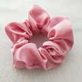 Close-up of pink satin silk scrunchie with soft fabric texture on grey felt background - 148 Bright Pink