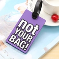 Purple PVC luggage tag with 'not YOUR BAG!' text and adjustable black strap - Purple