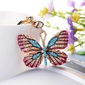 Elegante portachiavi a farfalla con strass colorati su anello in metallo dorato lucido - Azzurro