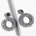 Macro detail of round beaded hoop earrings with silver-grey beads and black studs - erp45 Silver