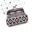 Detail of vintage bohemian coin purse with leopard print and classic metal clasp closure - Ethnic Style 3